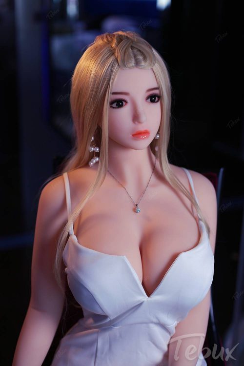 Full size sex doll Alexia sitting in white dress