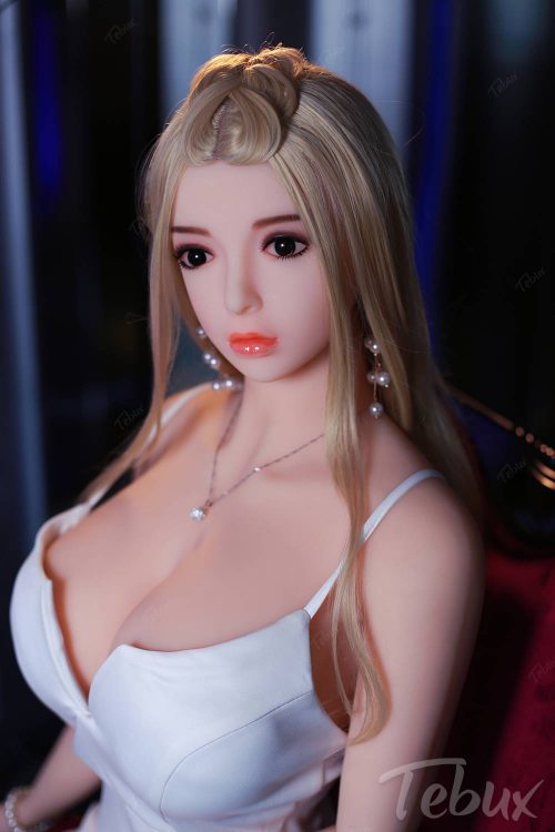 Full size sex doll Alexia sitting in white dress