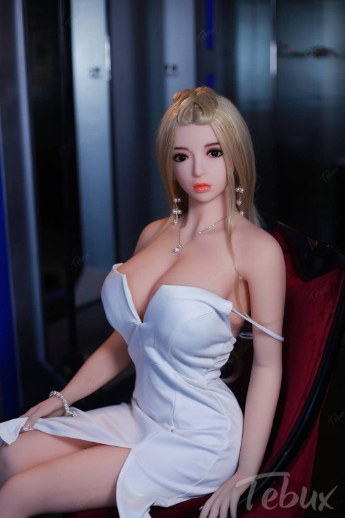 Full size sex doll Alexia sitting in white dress
