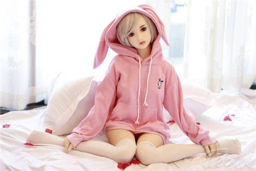 Cheap tpe sex doll sitting wearing pink jumper