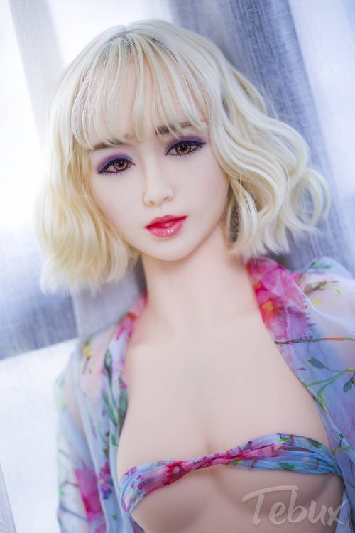 Flat chest sex doll wearing coloured top