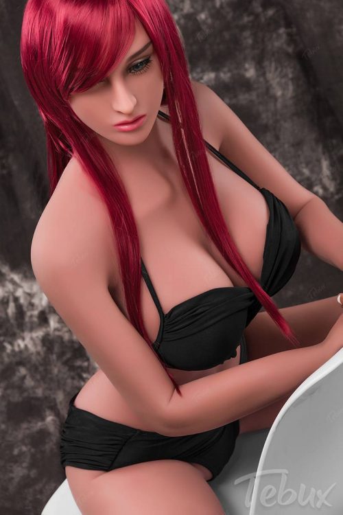 Real life sex doll Fiona sitting wearing black lingerie
