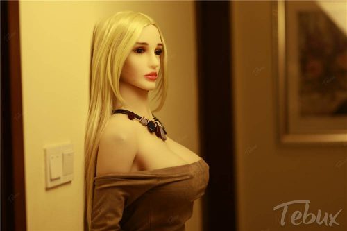 Blonde mature sex doll in brown dress with necklace