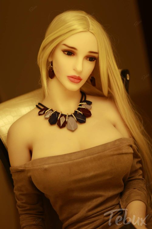 Blonde mature sex doll in brown dress with necklace